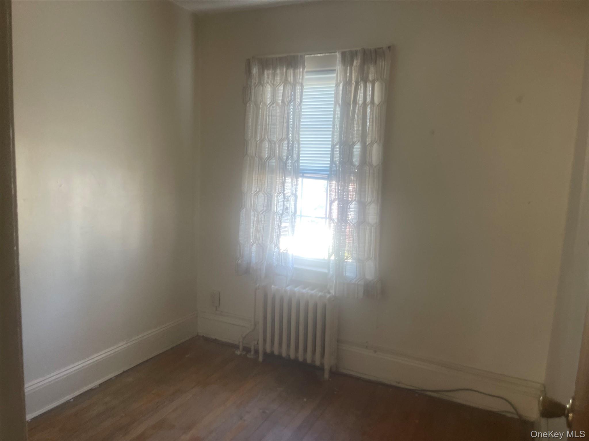 22 Eton Street Valley Stream, NY 11581 - Photo 18 of 30 an empty room with windows
