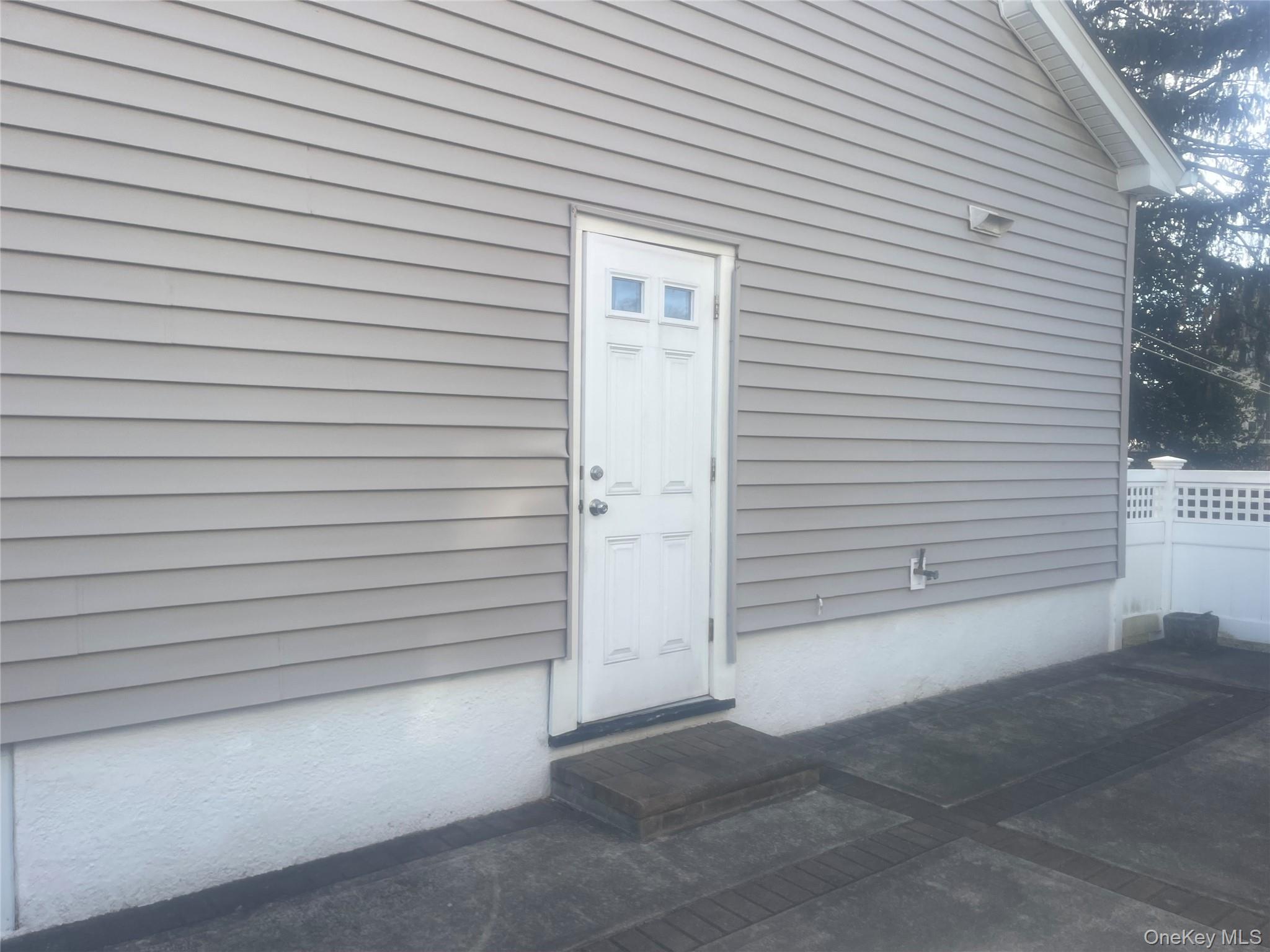 22 Eton Street Valley Stream, NY 11581 - Photo 23 of 30 a view of a house with white door
