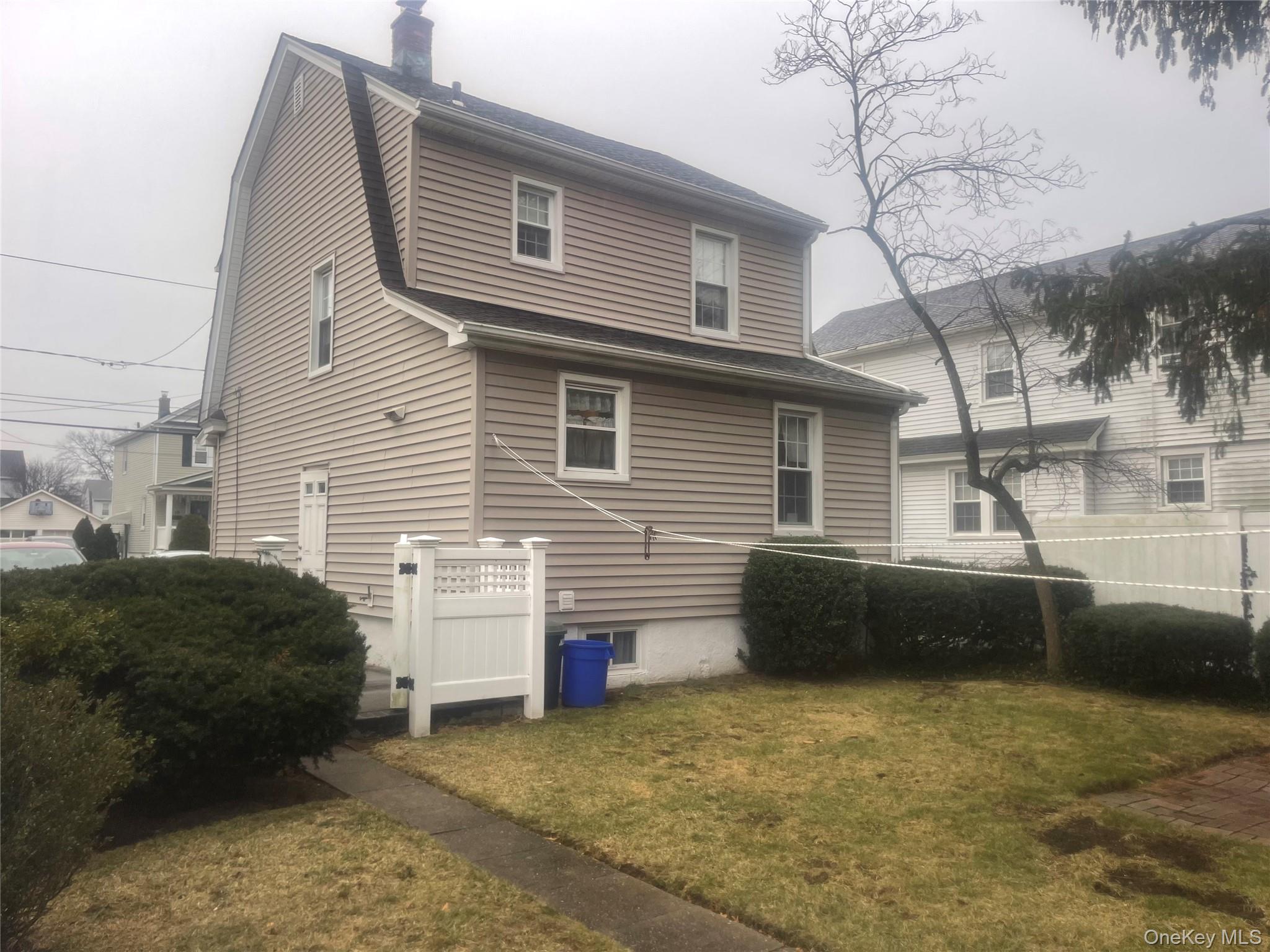 22 Eton Street Valley Stream, NY 11581 - Photo 25 of 30 a house view with a backyard space