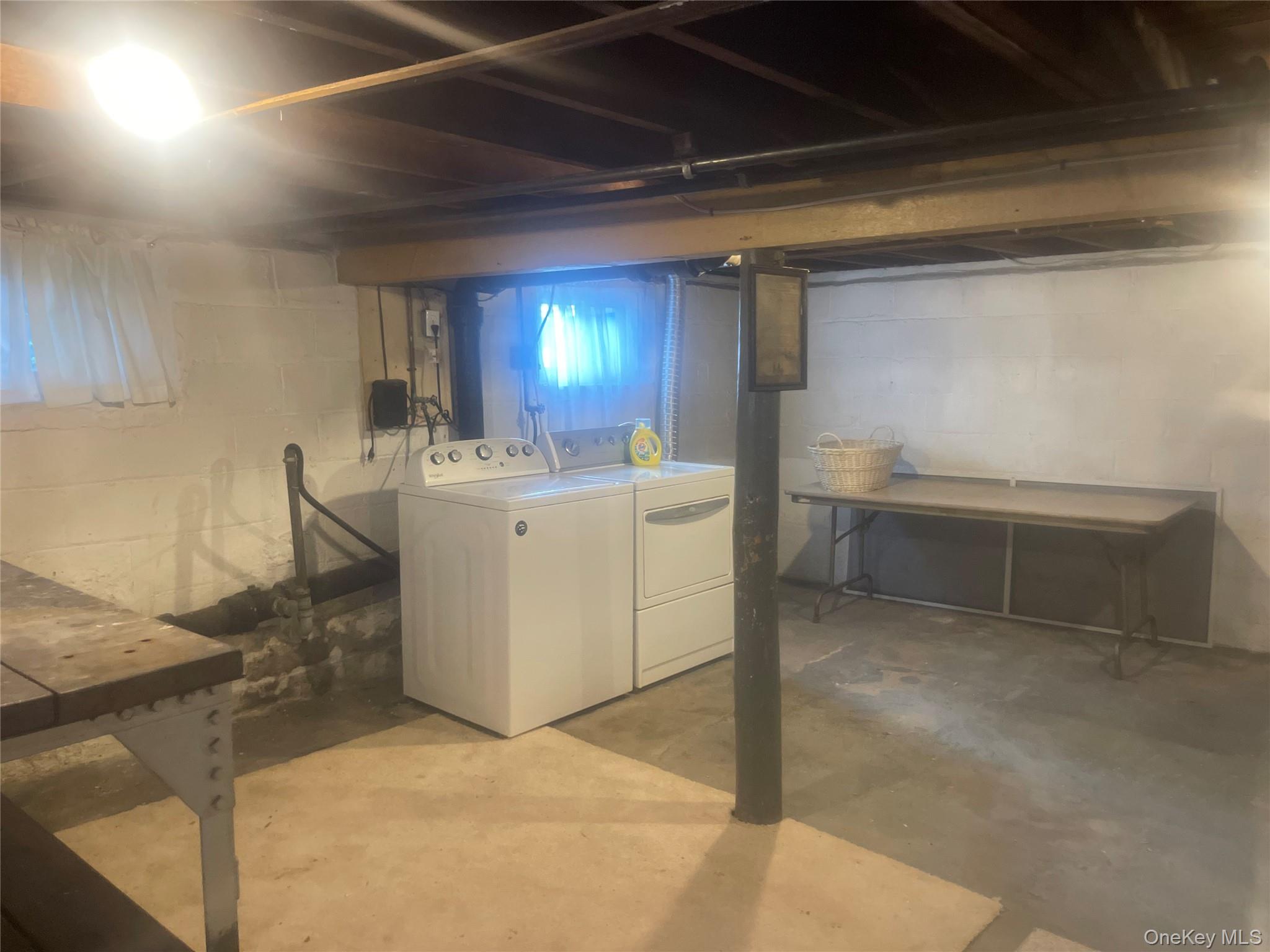 22 Eton Street Valley Stream, NY 11581 - Photo 27 of 30 a view of a storage & utility room with two washing machine