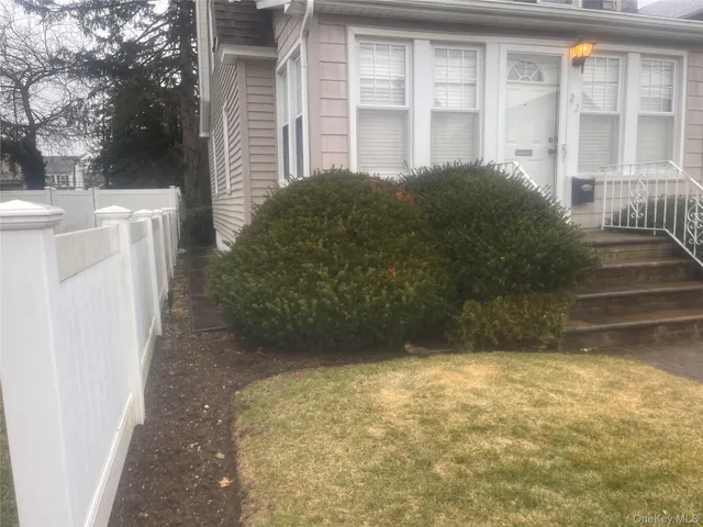 a view of a back yard of the house