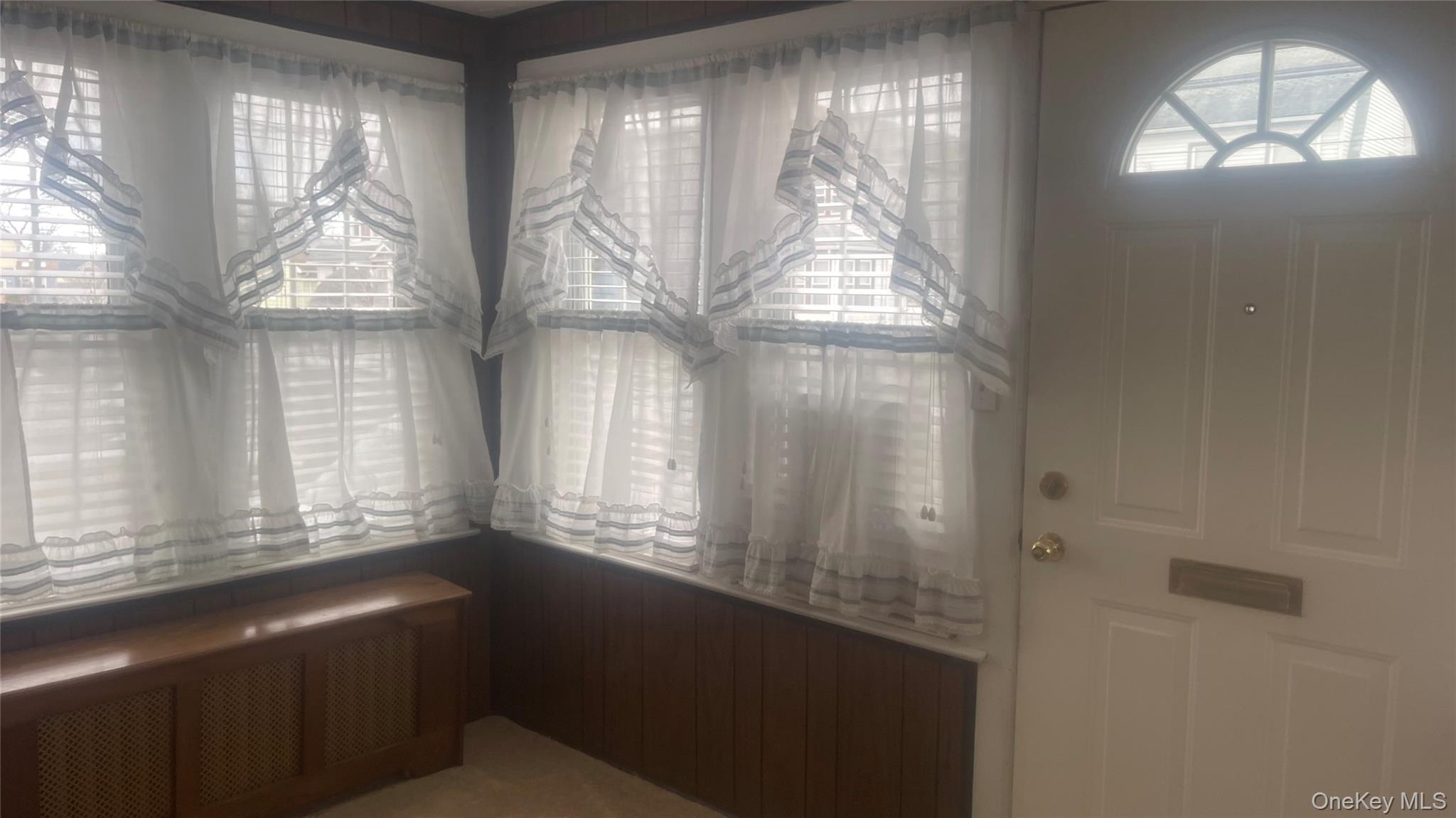22 Eton Street Valley Stream, NY 11581 - Photo 3 of 30 a room with windows and chandelier