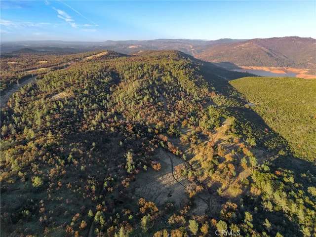 a view of a city with mountains in the background