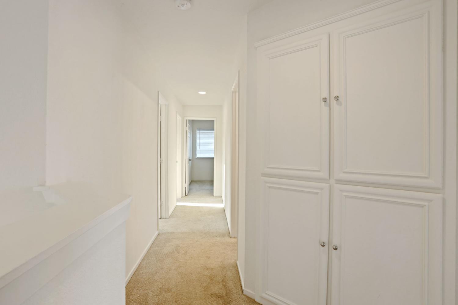 4882 Timepiece Circle Stockton, CA 95219 - Photo 24 of 43 a view of a bathroom from the hallway
