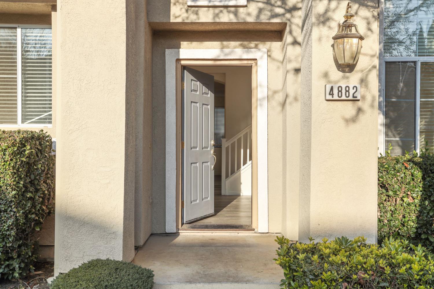 4882 Timepiece Circle Stockton, CA 95219 - Photo 3 of 43 a view of a entryway door front of house