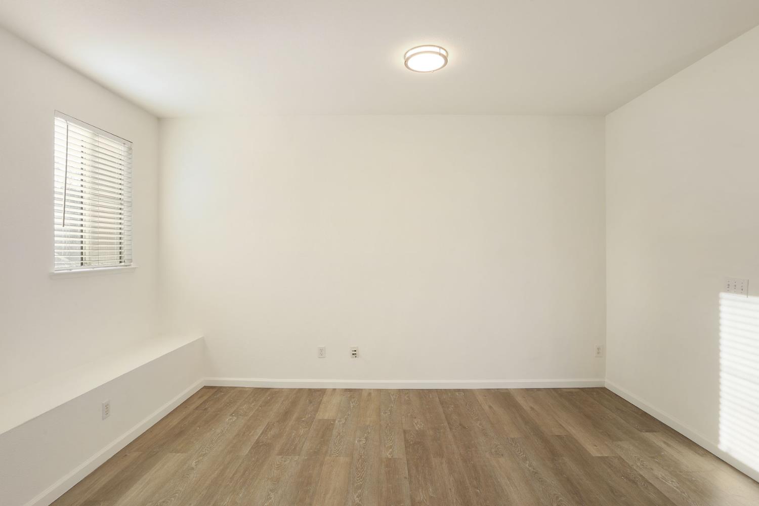 4882 Timepiece Circle Stockton, CA 95219 - Photo 7 of 43 an empty room with a window