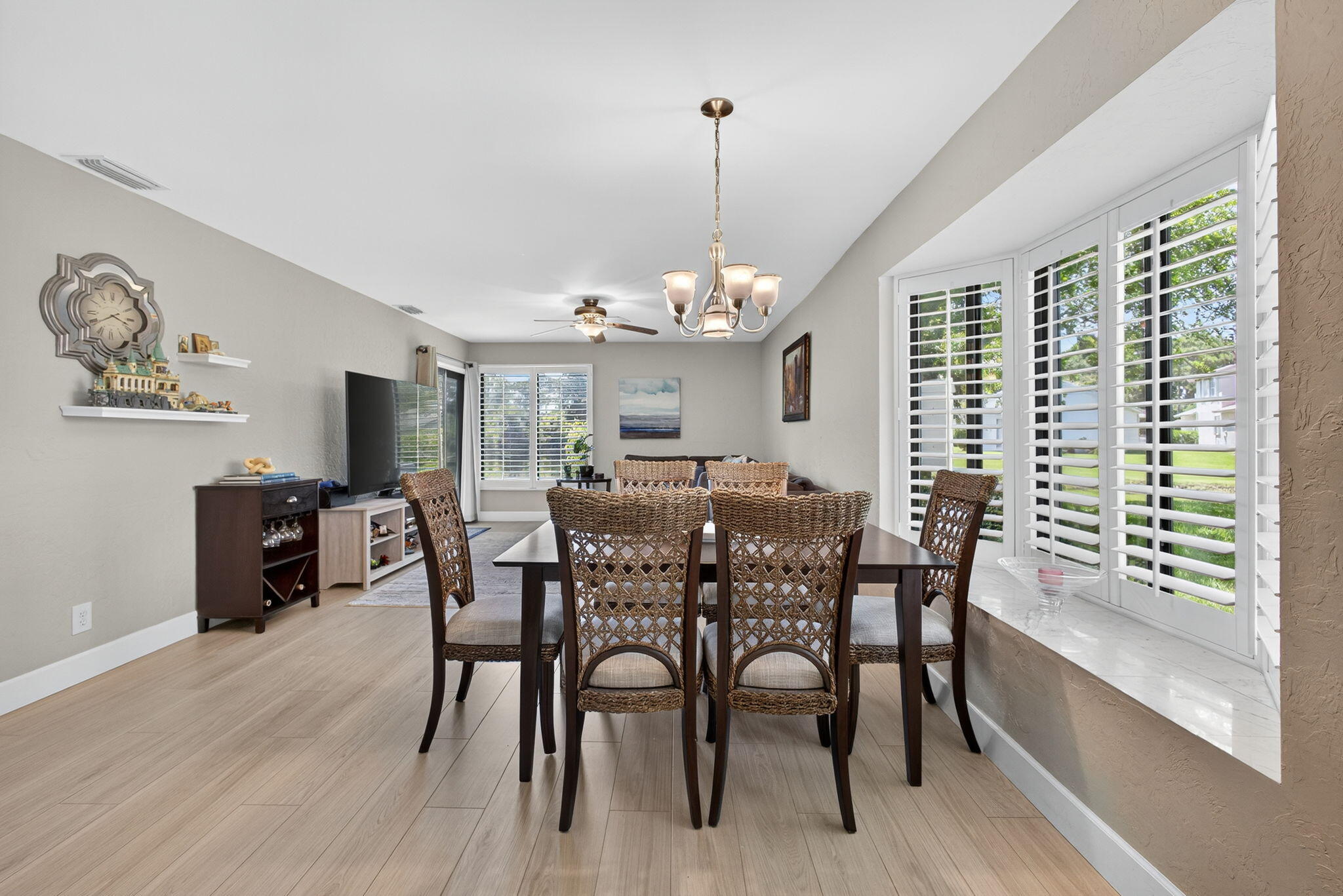 406 Harbour Pointe Way Greenacres, FL 33413 - Photo 15 of 79 a view of a dining room with furniture window and wooden floor