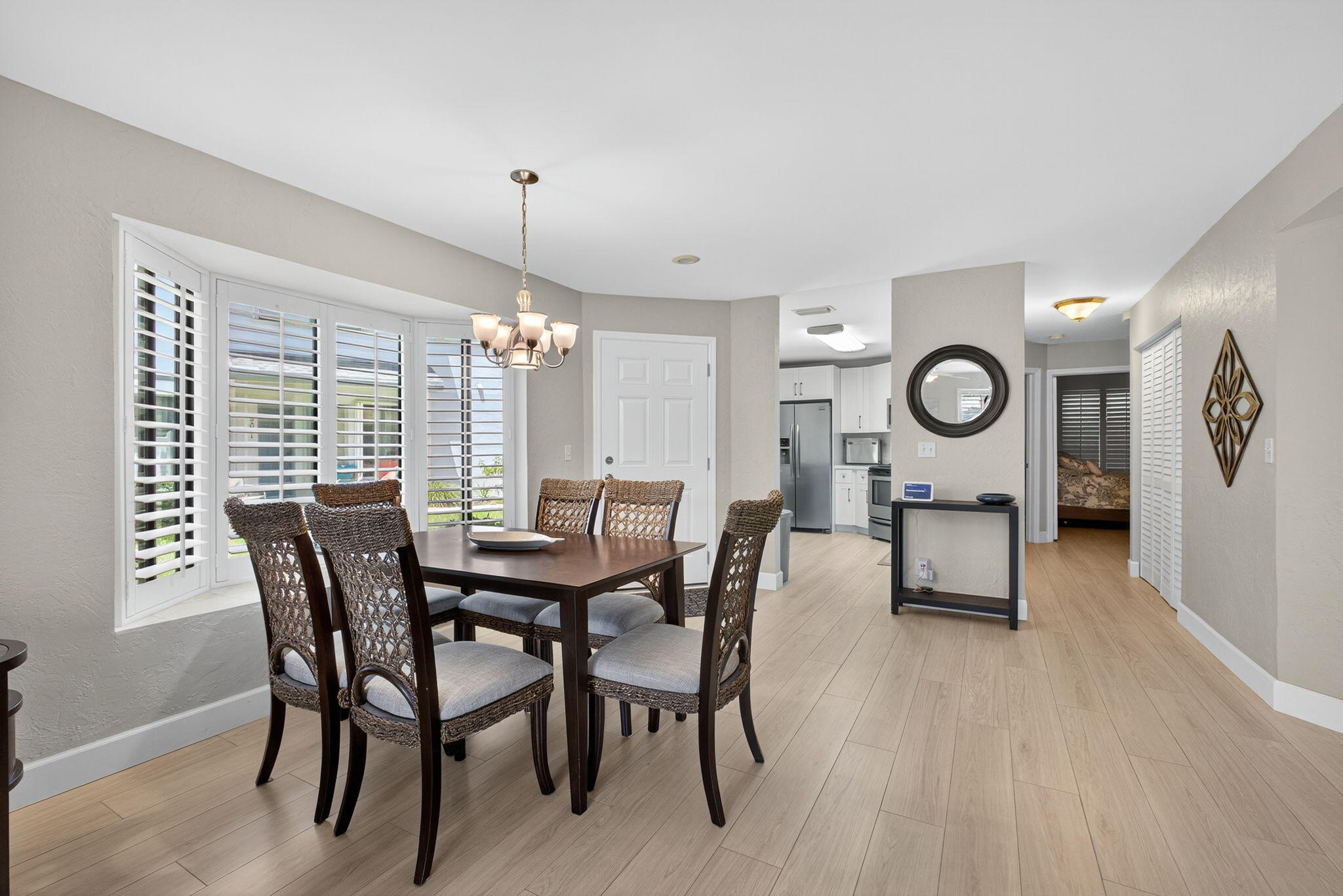 406 Harbour Pointe Way Greenacres, FL 33413 - Photo 19 of 79 a view of a dining room with furniture window and wooden floor
