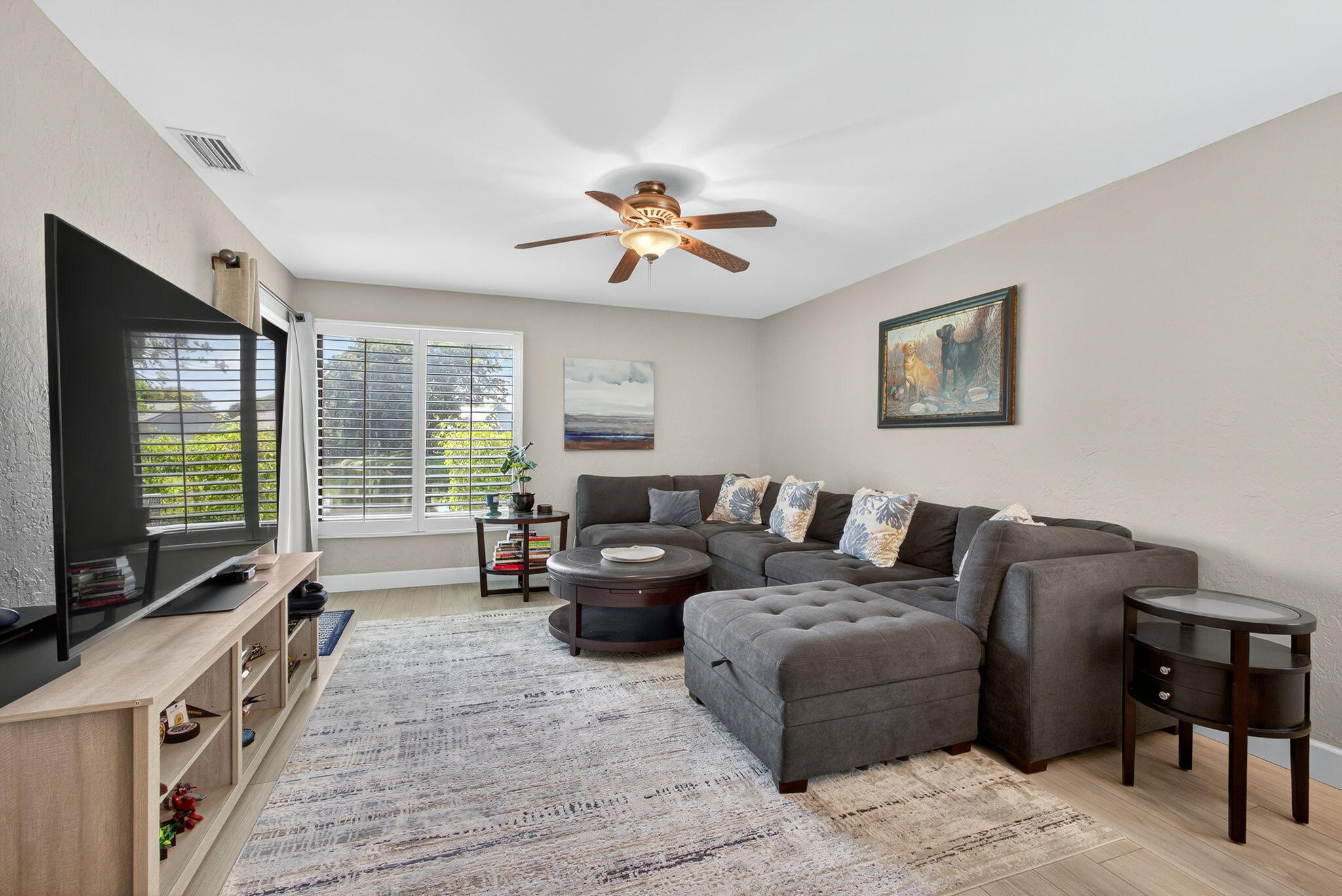 406 Harbour Pointe Way Greenacres, FL 33413 - Photo 20 of 79 a living room with furniture and a flat screen tv