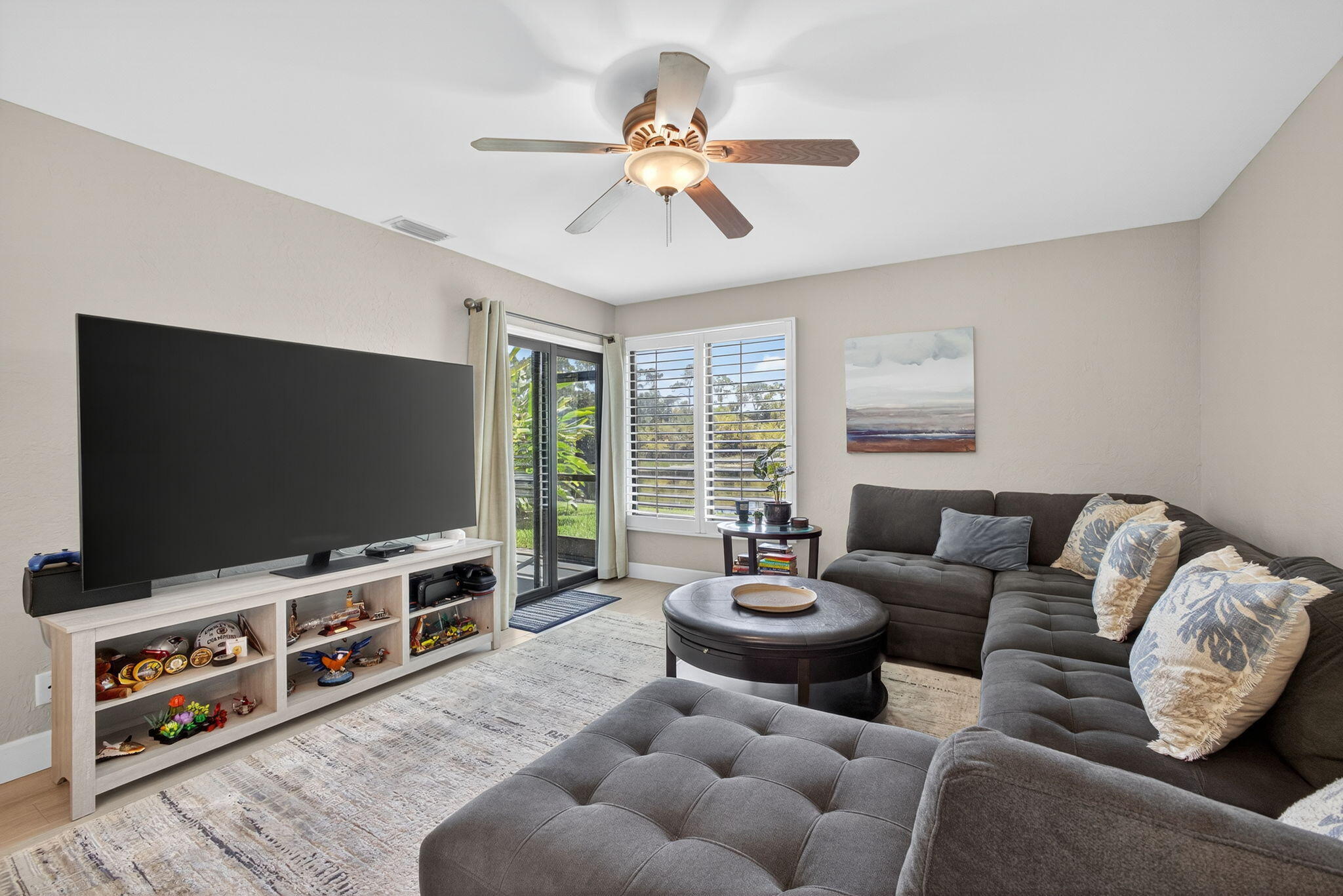 406 Harbour Pointe Way Greenacres, FL 33413 - Photo 22 of 79 a living room with furniture and a flat screen tv