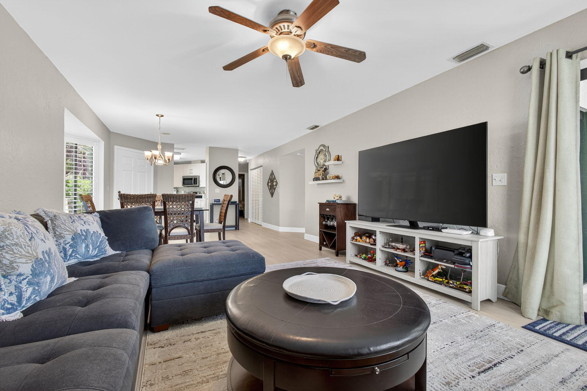 406 Harbour Pointe Way Greenacres, FL 33413 - Photo 25 of 79 a living room with furniture and a flat screen tv