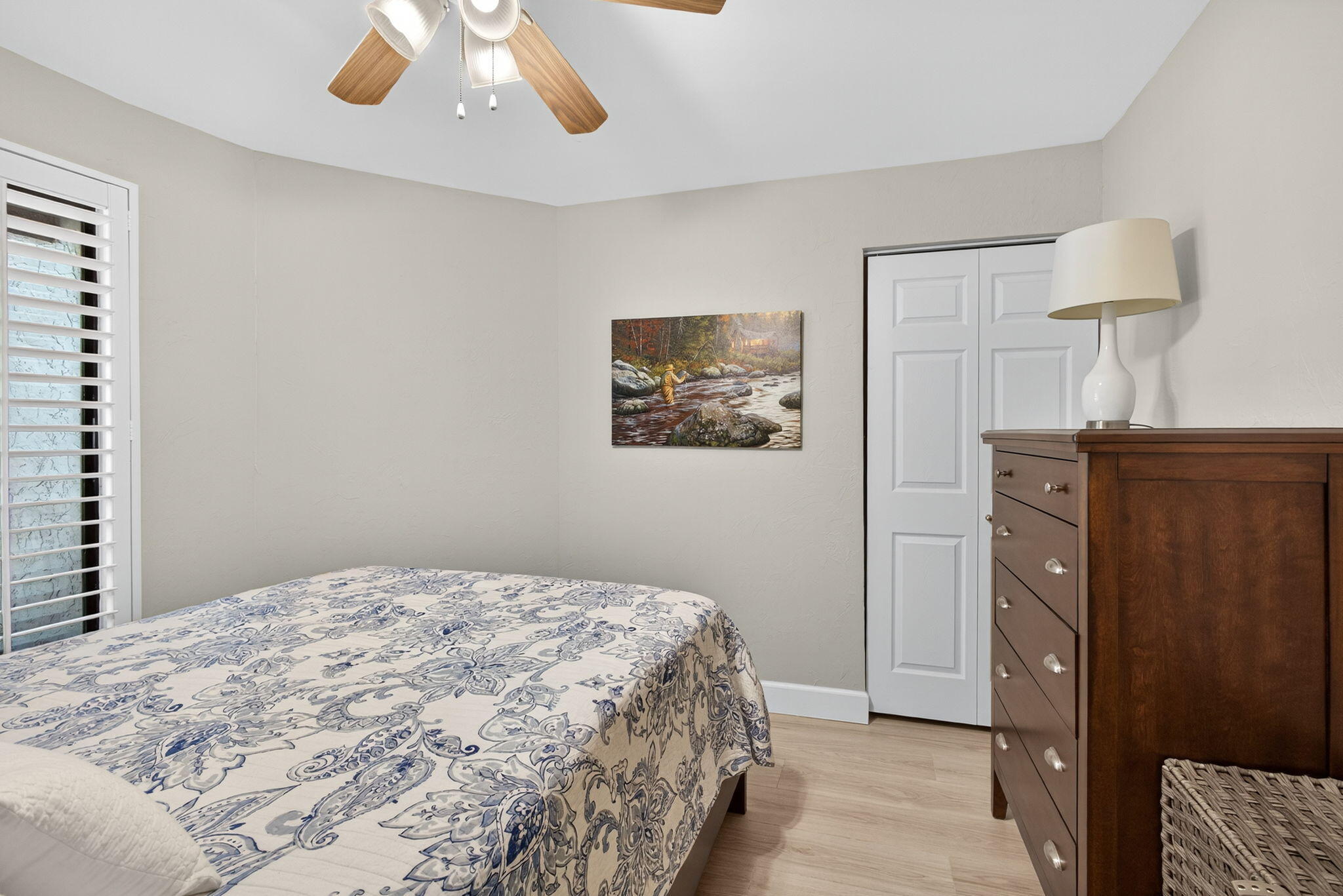 406 Harbour Pointe Way Greenacres, FL 33413 - Photo 34 of 79 a bedroom with a bed and a lamp on table