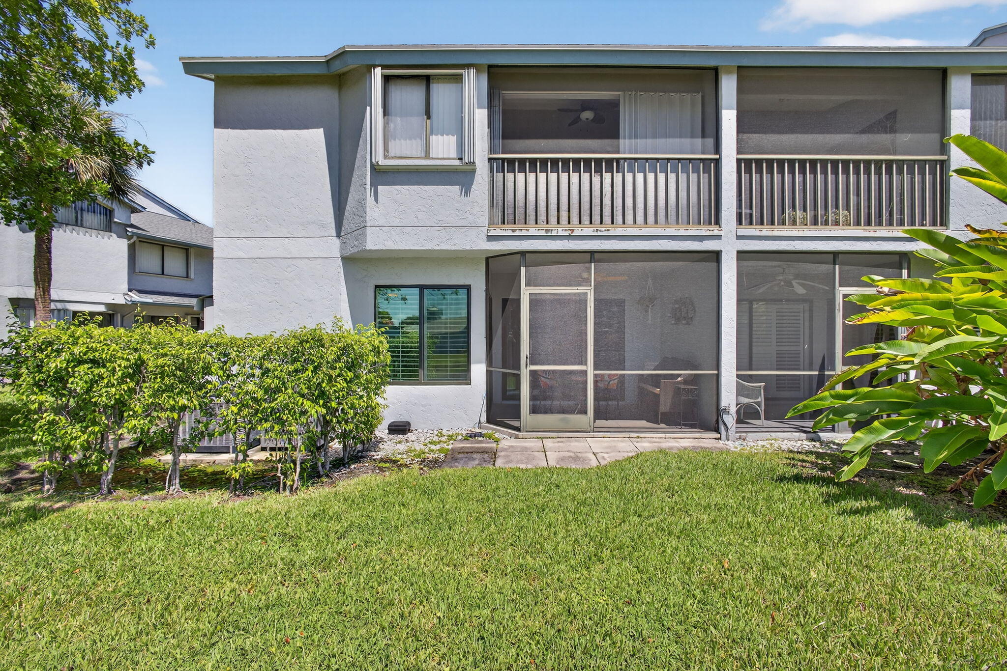 406 Harbour Pointe Way Greenacres, FL 33413 - Photo 51 of 79 a front view of a house with a yard