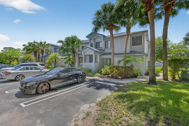 a car parked in front of a house