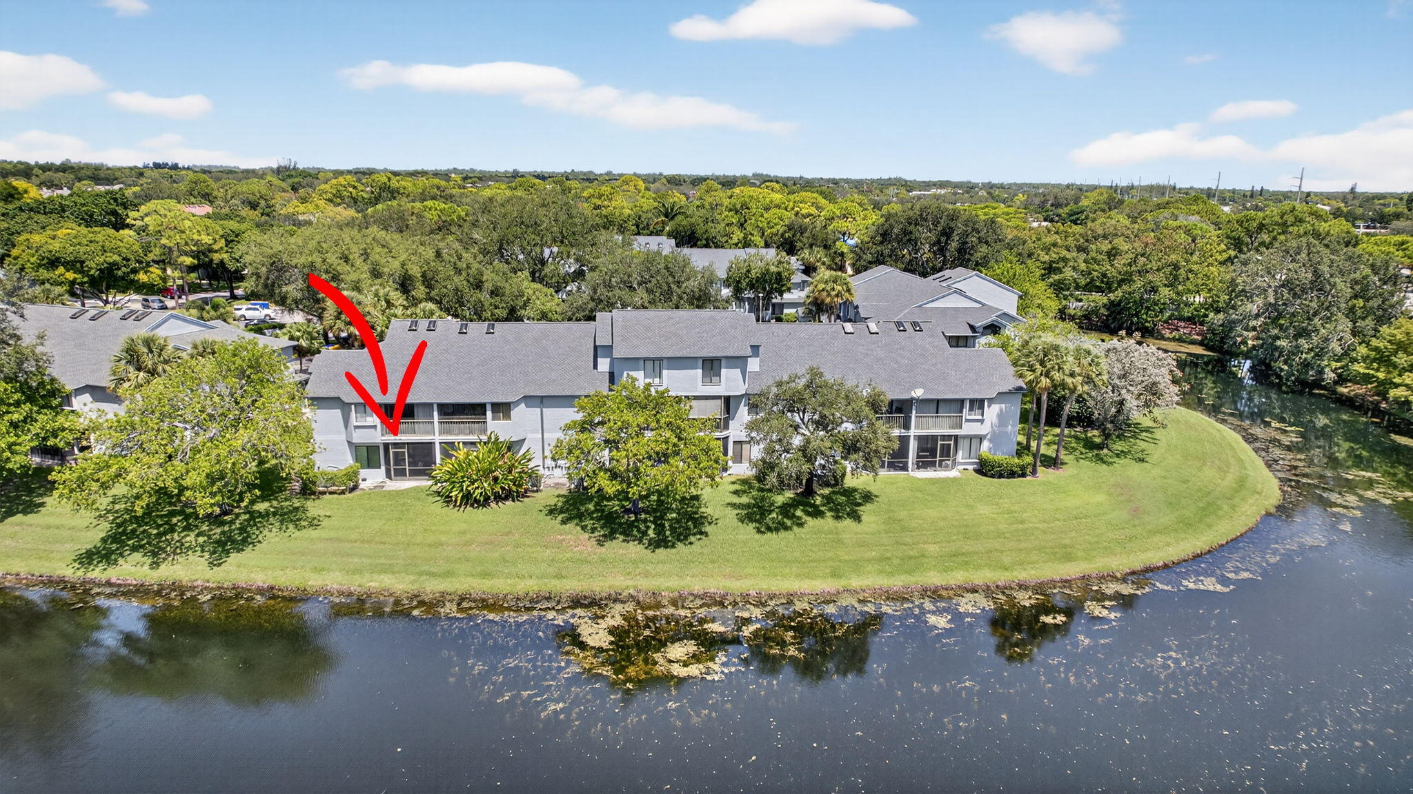 406 Harbour Pointe Way Greenacres, FL 33413 - Photo 67 of 79 an aerial view of a house with a garden and lake view