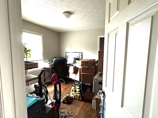 102 Cofer Drive Springfield, TN 37172 - Photo 12 of 18 a view of workspace with wooden floor windows and piano