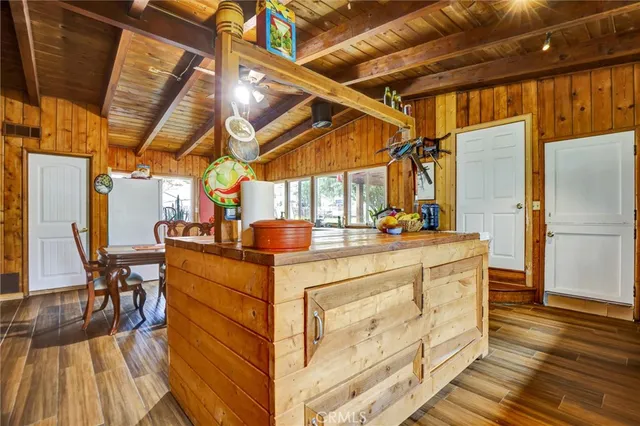 a view of bathroom with sink and wooden floor