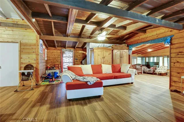 a outdoor living space with furniture and wooden floor