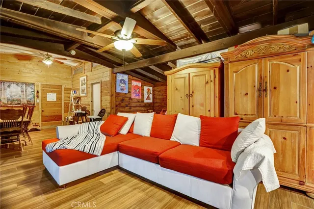 a view of a swimming pool with furniture