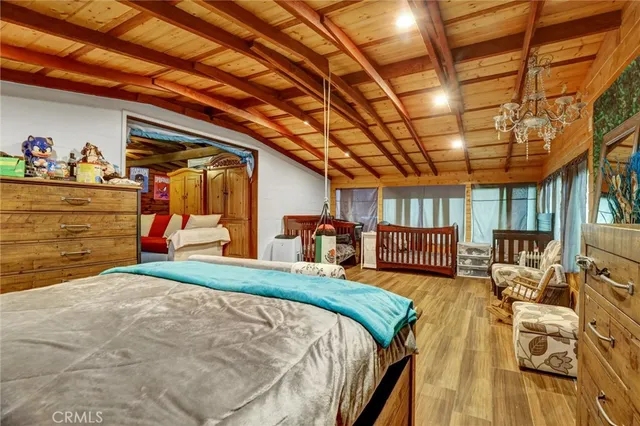 a view of a chairs in wooden floor