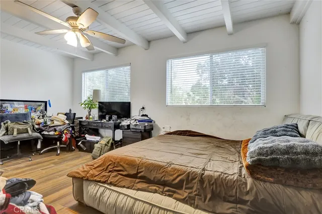 a view of a hallway with washer and dryer on a table