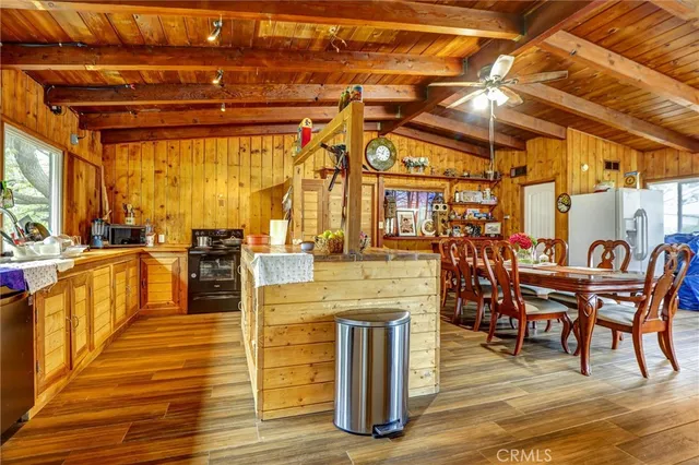 a view of a swimming pool with outdoor seating
