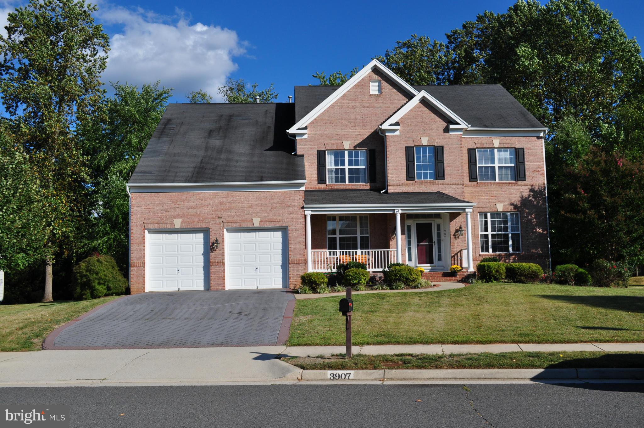 3907 Pender Spring Drive Fairfax, VA 22033 - Photo 2 of 30 a front view of a house with a yard