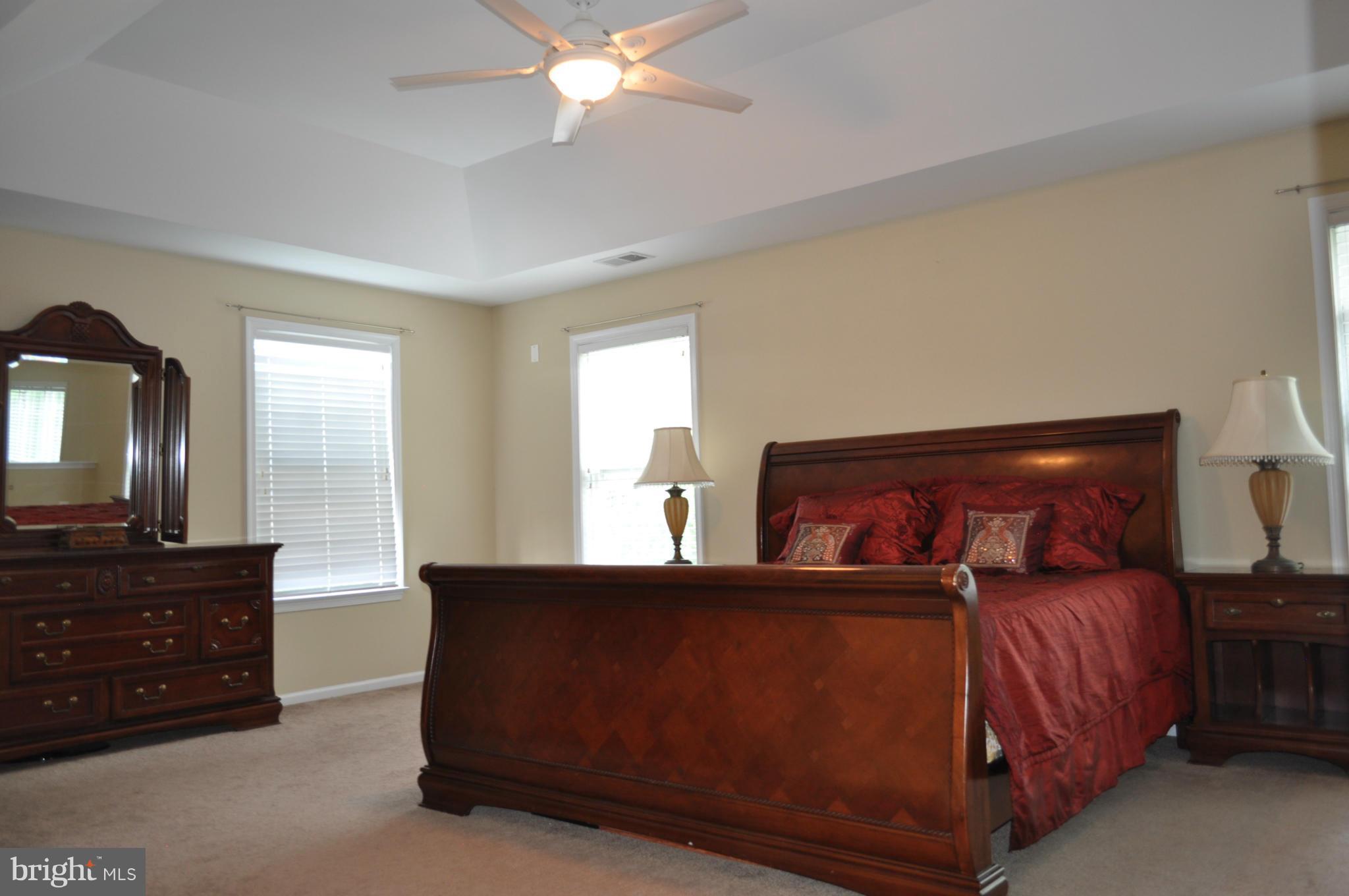 3907 Pender Spring Drive Fairfax, VA 22033 - Photo 13 of 30 a bed room with a bed and a television