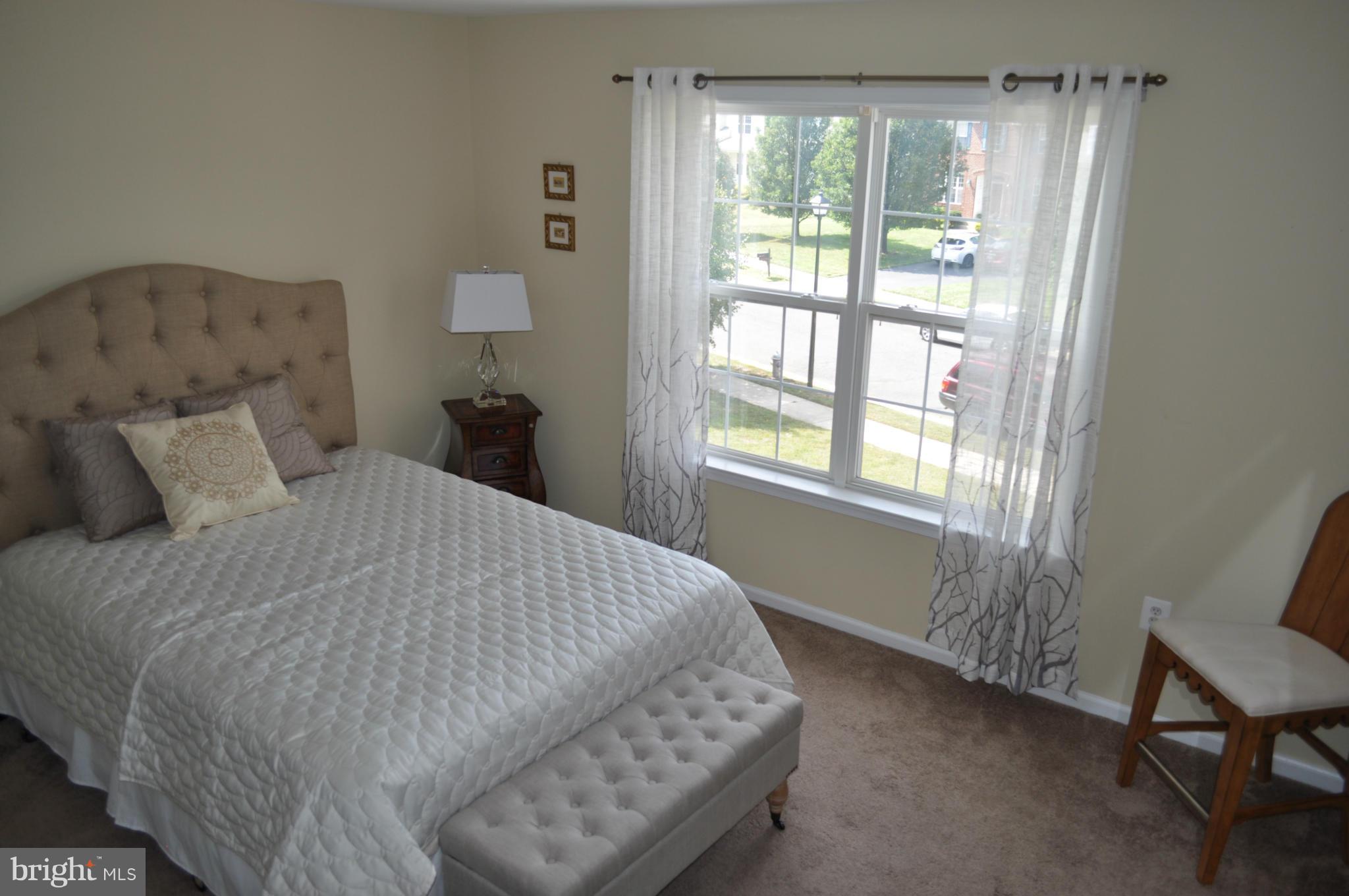 3907 Pender Spring Drive Fairfax, VA 22033 - Photo 17 of 30 a bedroom with a bed and a window