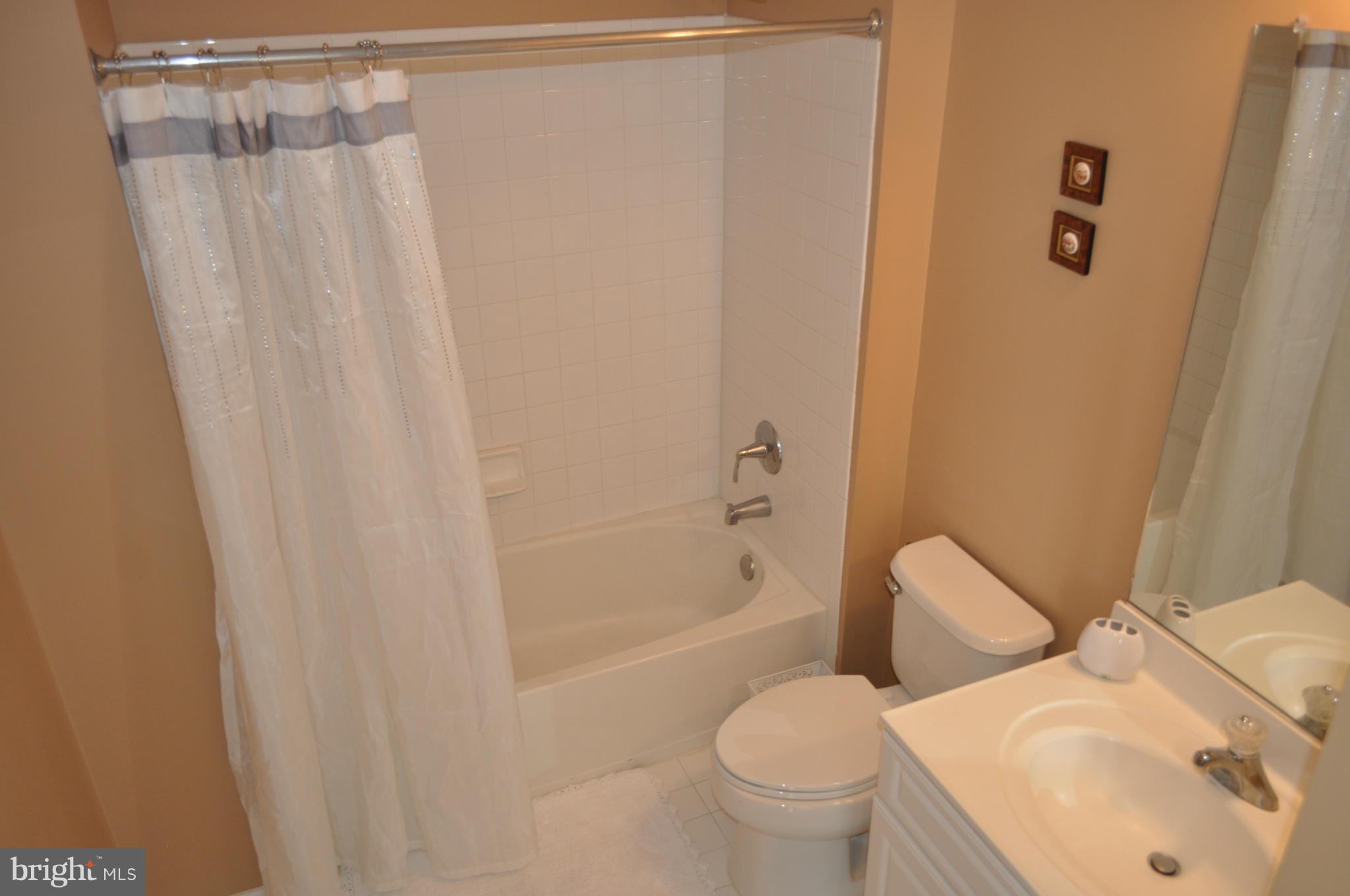 3907 Pender Spring Drive Fairfax, VA 22033 - Photo 21 of 30 a bathroom with a sink toilet and shower