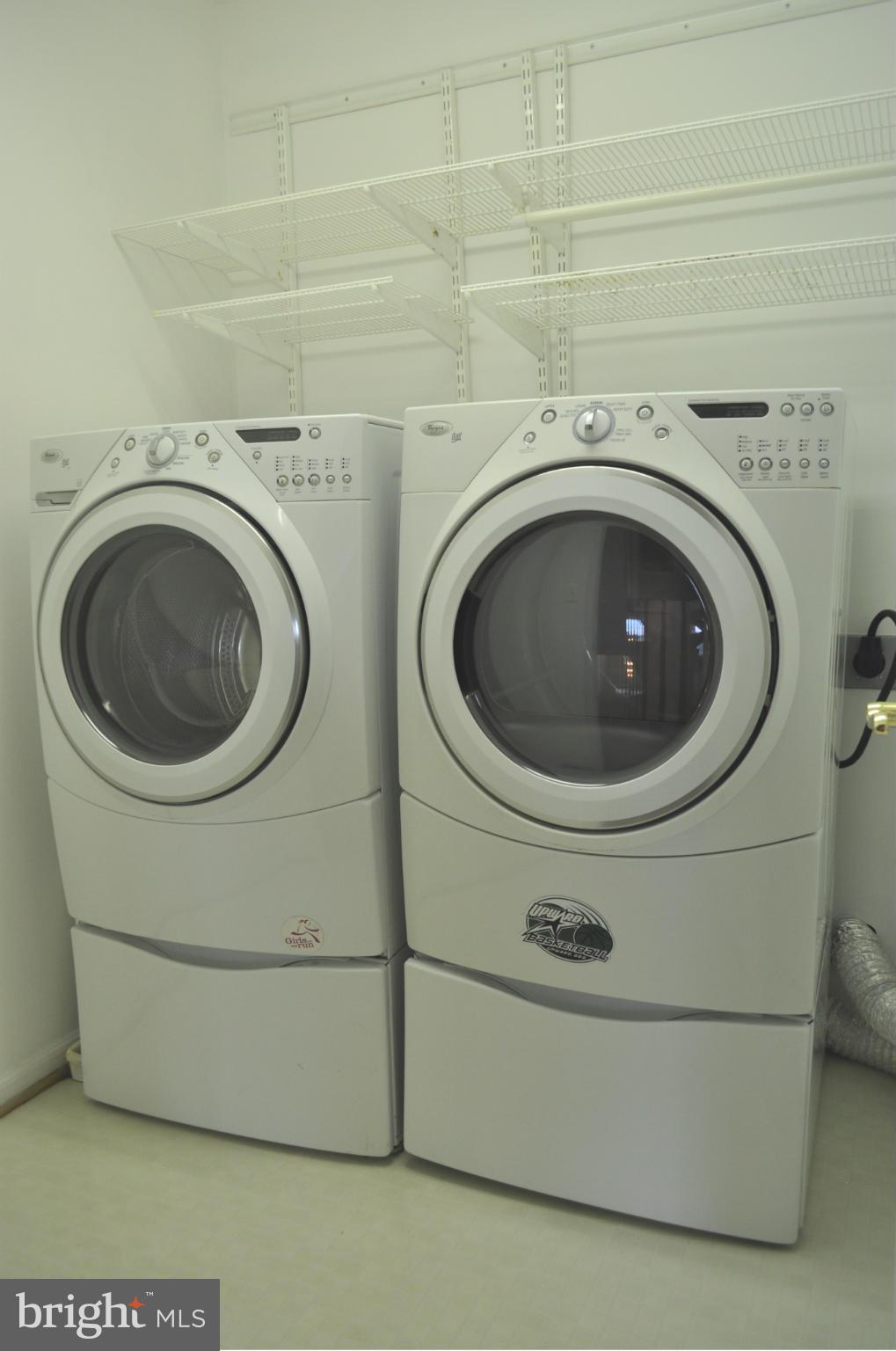 3907 Pender Spring Drive Fairfax, VA 22033 - Photo 26 of 30 a close up view of a washer and dryer