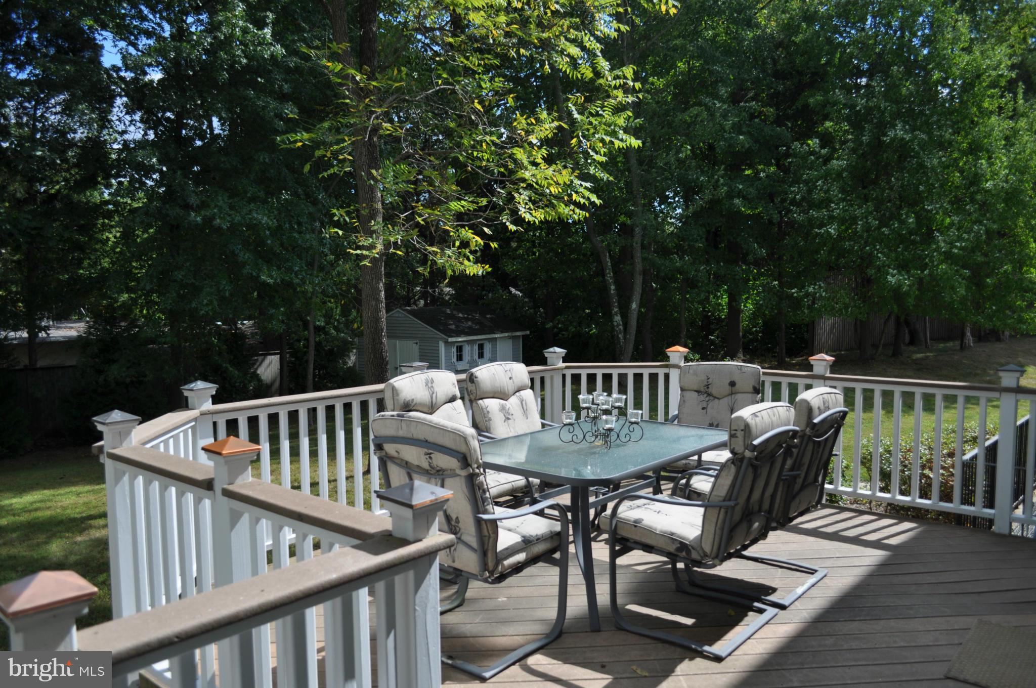 3907 Pender Spring Drive Fairfax, VA 22033 - Photo 28 of 30 a view of balcony with furniture and trees