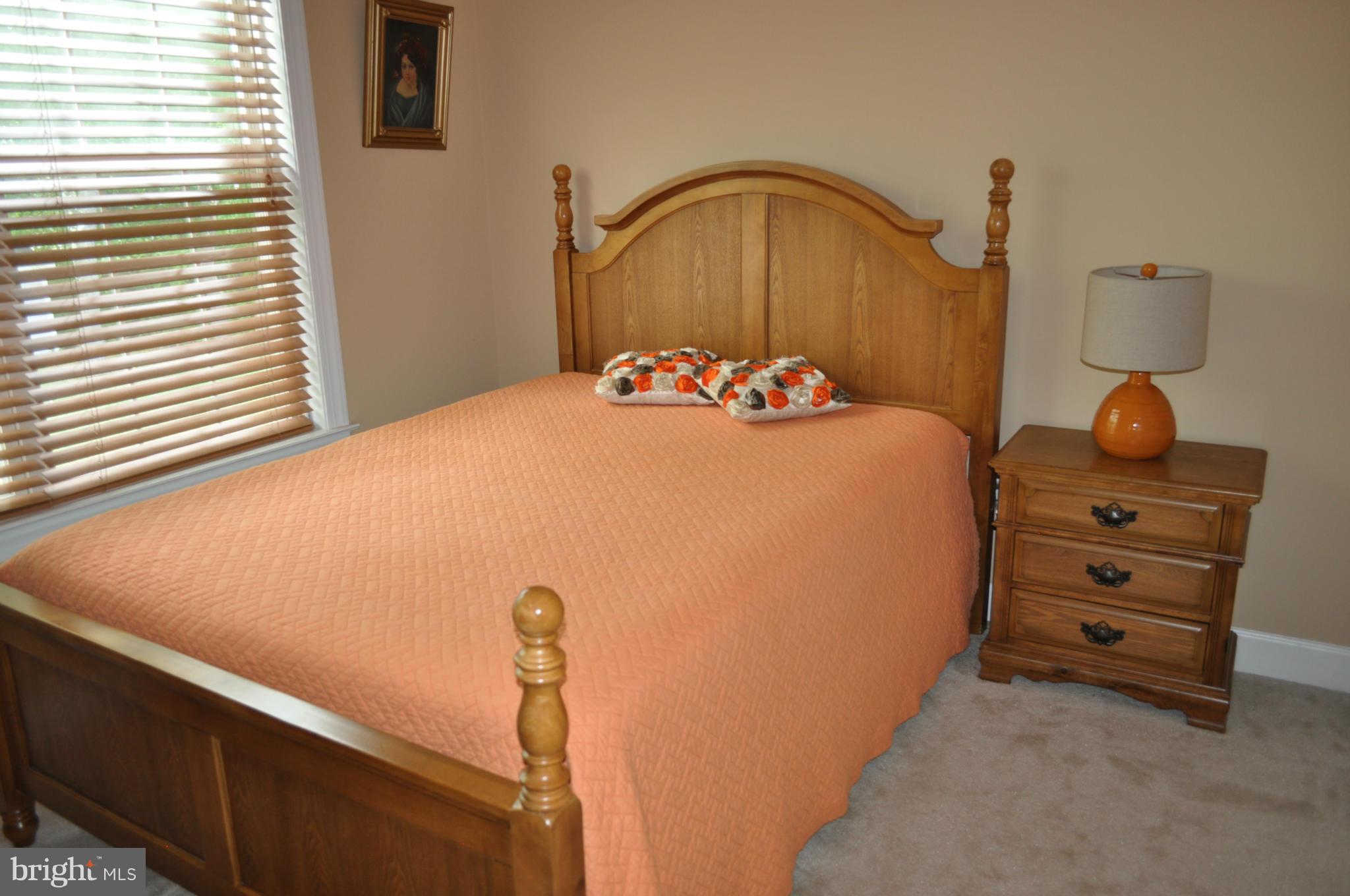 3907 Pender Spring Drive Fairfax, VA 22033 - Photo 10 of 30 a bedroom with a bed and a mirror