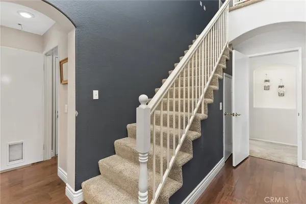 a view of entryway with wooden floor