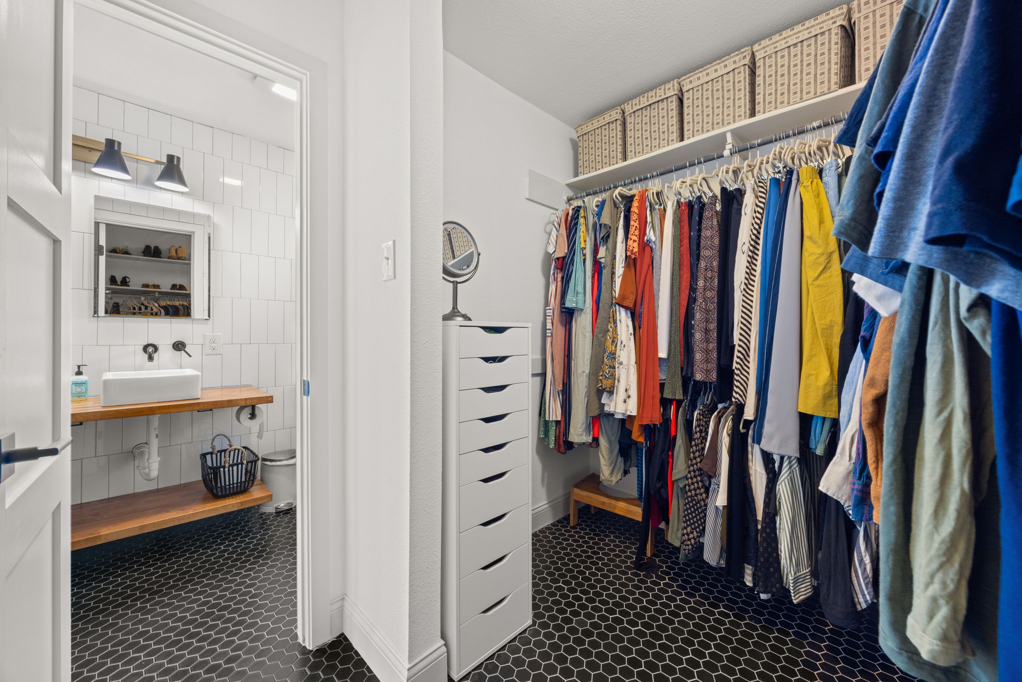 8401 Alabama Drive Austin, TX 78745 - Photo 13 of 23 a view of walk in closet with clothes and shoes
