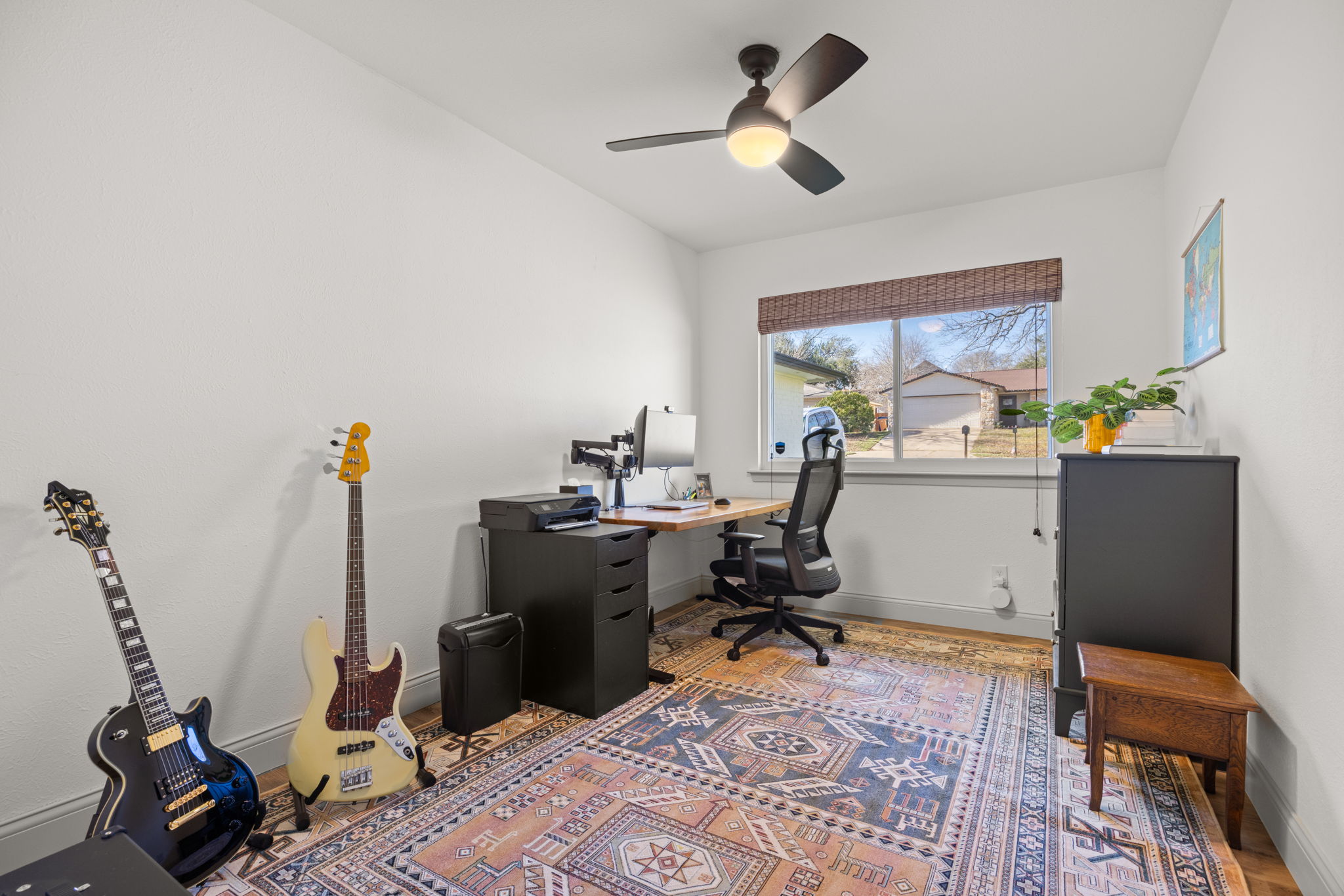8401 Alabama Drive Austin, TX 78745 - Photo 16 of 23 a work room with furniture and a window