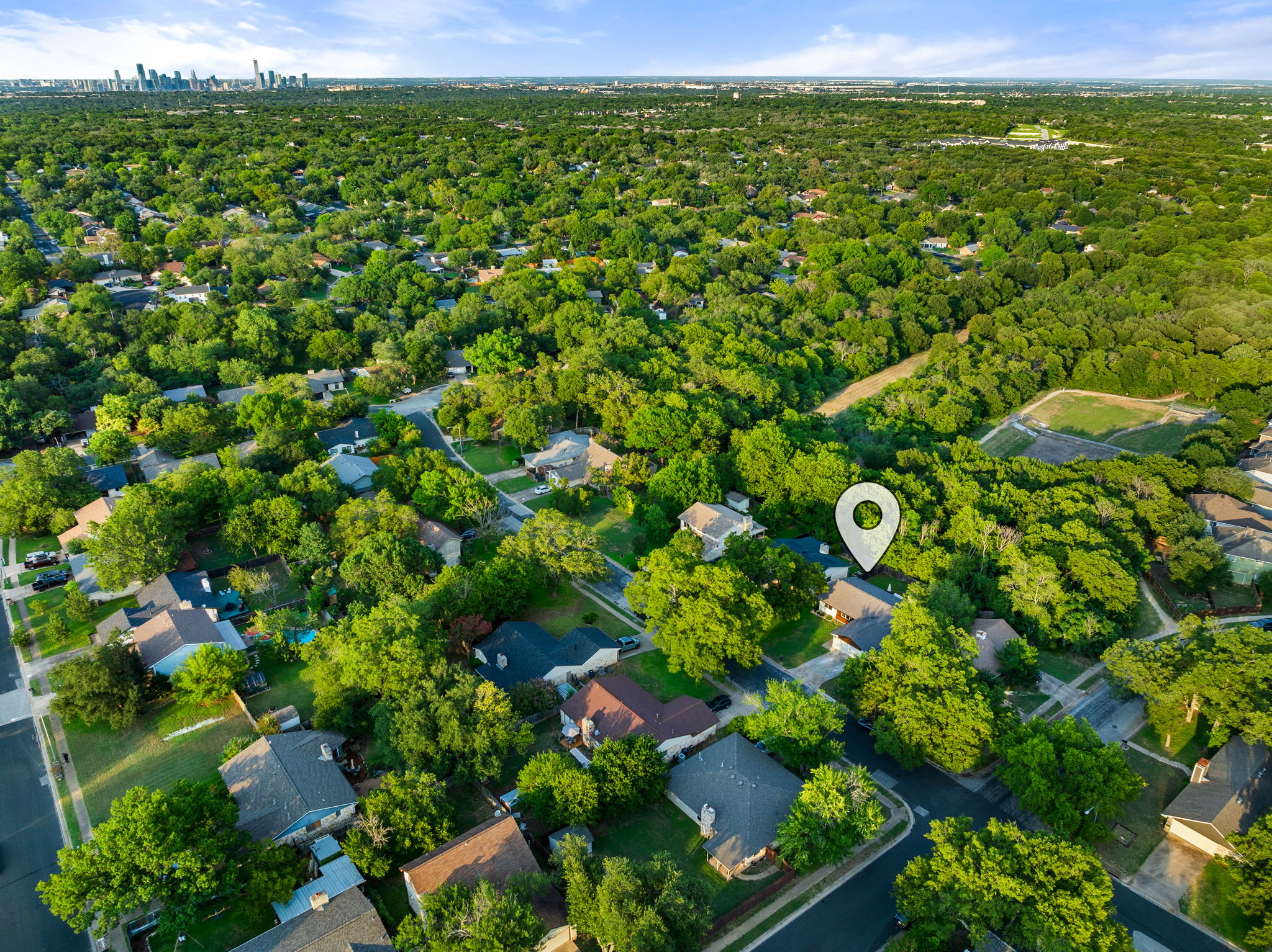 8401 Alabama Drive Austin, TX 78745 - Photo 22 of 23 a view of a lush green space with sea