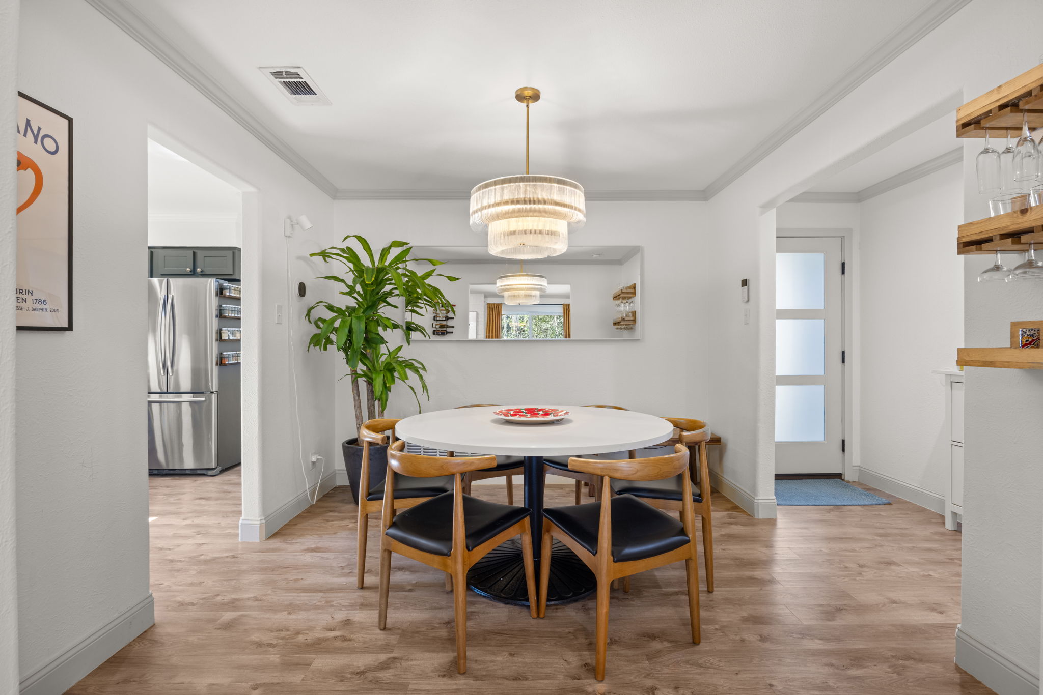 8401 Alabama Drive Austin, TX 78745 - Photo 8 of 23 a view of a dining room with furniture window and wooden floor