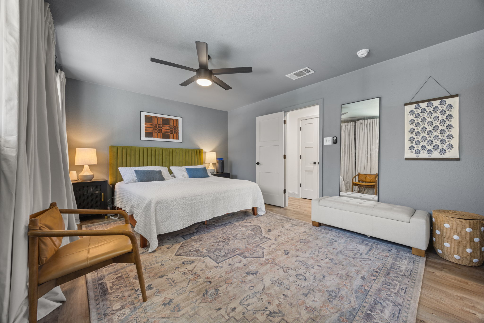 8401 Alabama Drive Austin, TX 78745 - Photo 10 of 23 a bedroom with a bed couch and a window