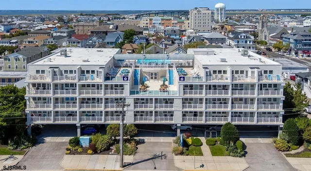 a view of a building with a garden
