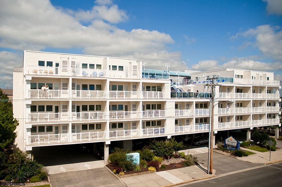 820 Ocean Avenue, Unit 115 Ocean City, NJ 08226 - Photo 2 of 58 a view of a large building with a street