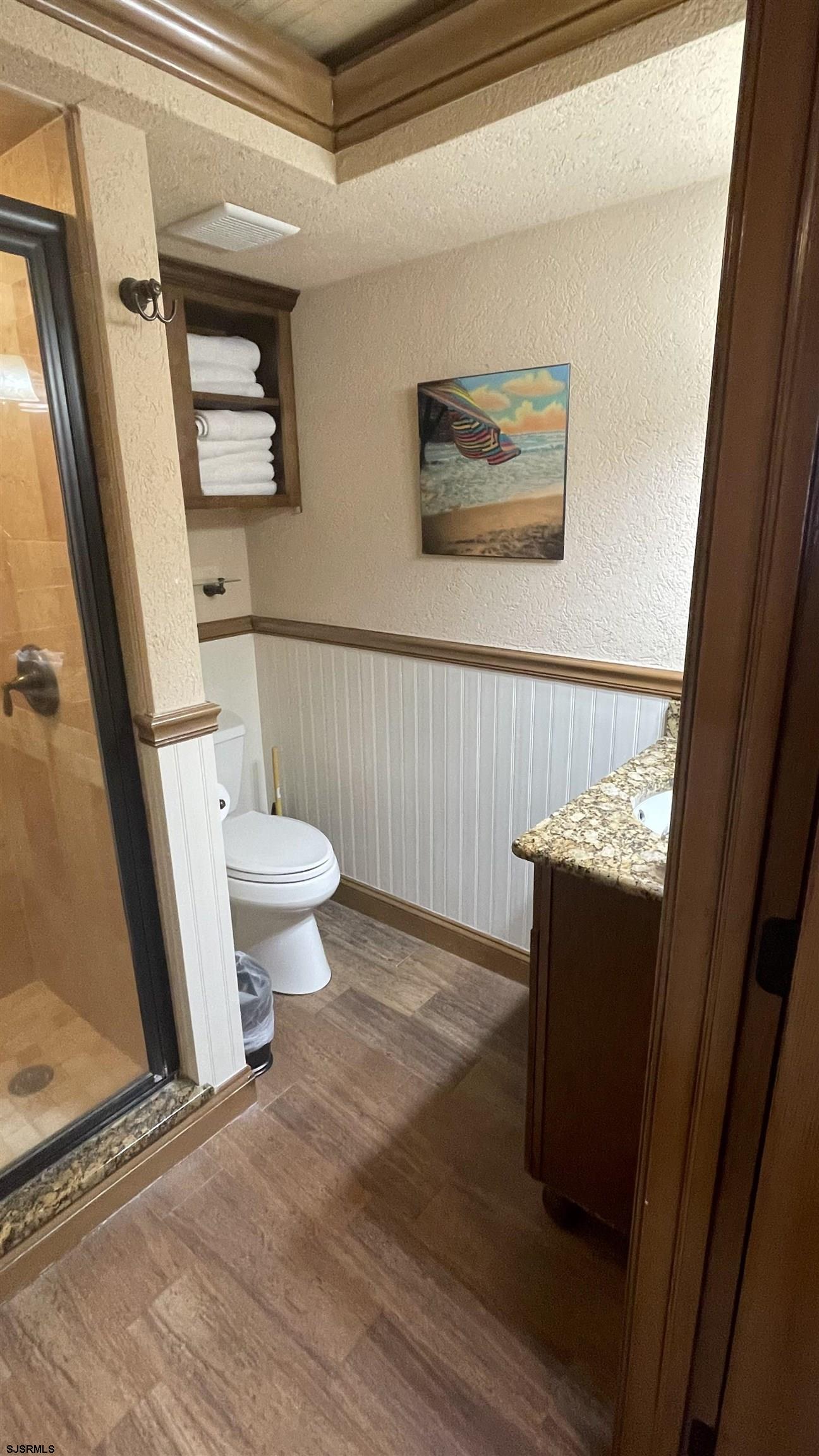 820 Ocean Avenue, Unit 115 Ocean City, NJ 08226 - Photo 29 of 58 a bathroom with a sink and a toilet