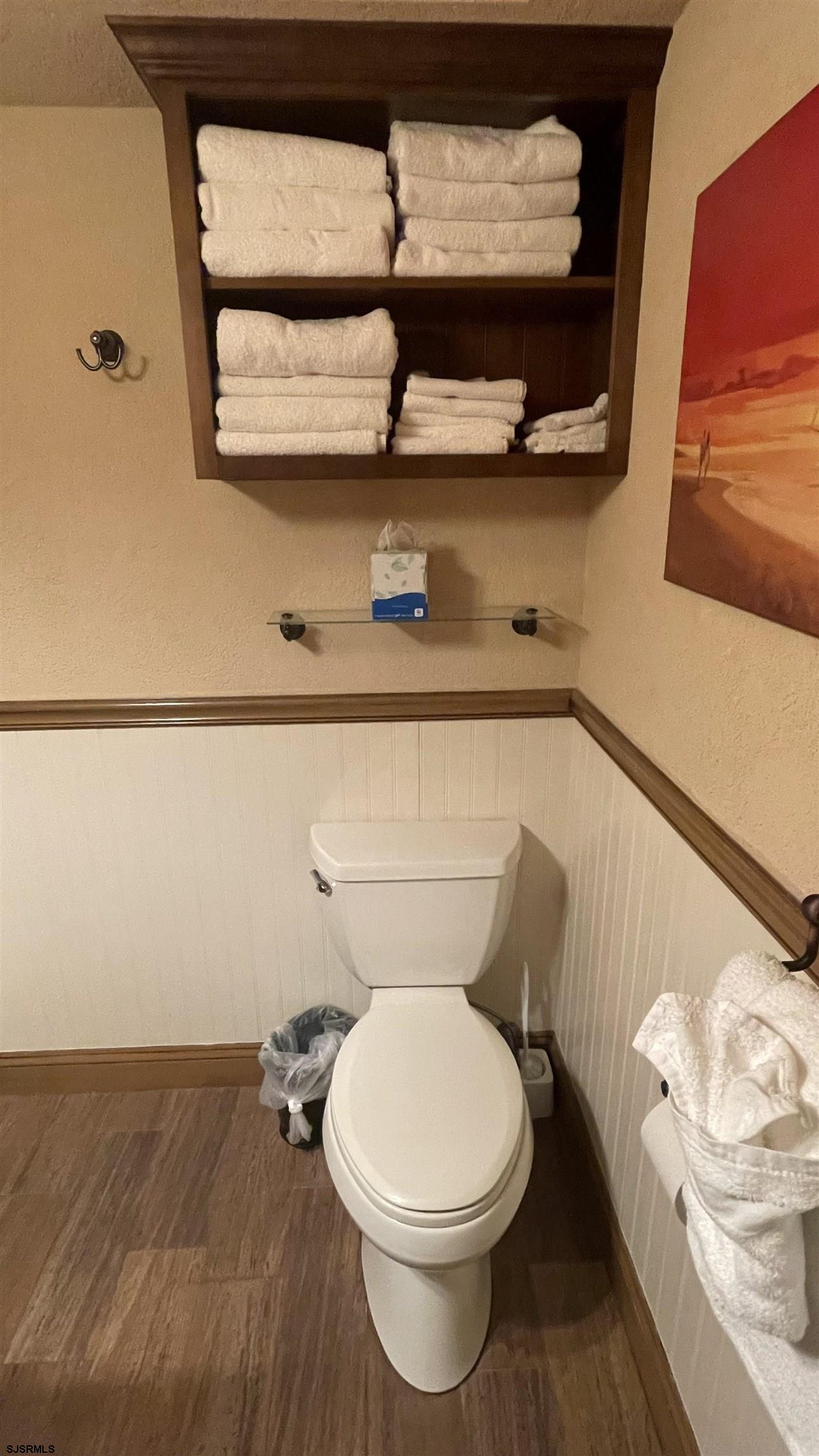 820 Ocean Avenue, Unit 115 Ocean City, NJ 08226 - Photo 47 of 58 a bathroom with a toilet and a sink