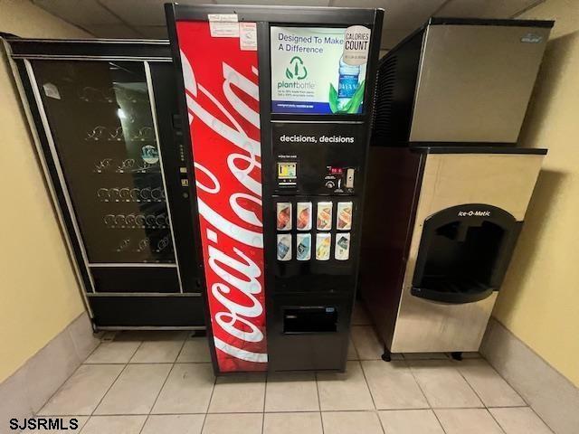820 Ocean Avenue, Unit 115 Ocean City, NJ 08226 - Photo 58 of 58 a bathroom with a toilet and a shower curtain