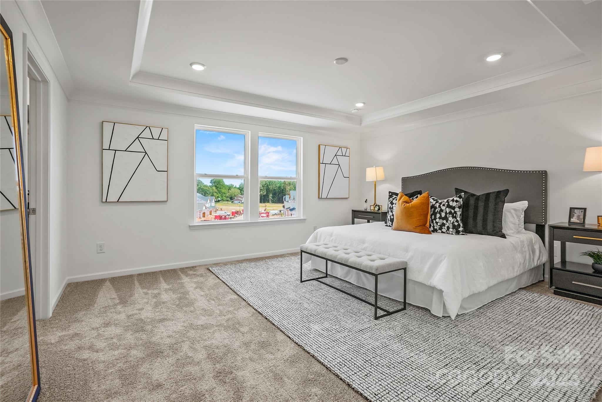 5920 Chumbley Pt Road, Unit 86 Charlotte, NC 28215 - Photo 4 of 5 a bedroom with a large bed and a window