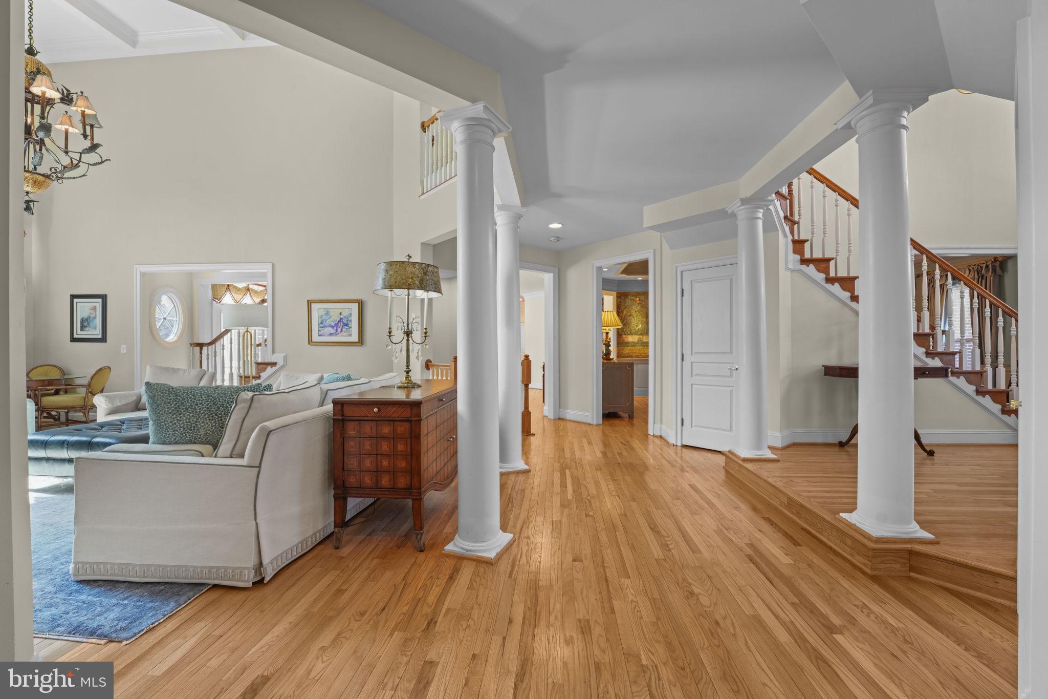 11431 Woolington Road Great Falls, VA 22066 - Photo 15 of 49 a view of a living room kitchen and a wooden floor