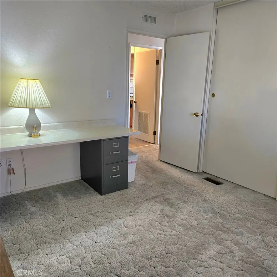 1536 South State Street, Unit 219 Hemet, CA 92543 - Photo 17 of 23 a kitchen with a cabinets and a sink