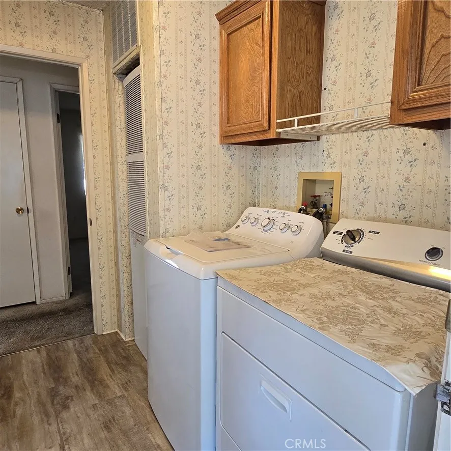 1536 South State Street, Unit 219 Hemet, CA 92543 - Photo 22 of 23 a bathroom with a sink and vanity