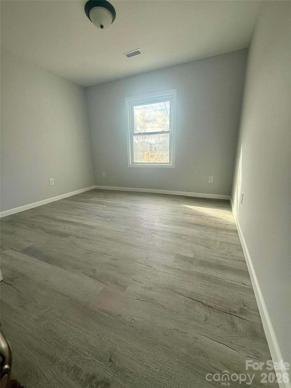 6457 Hudlow Road Union Mills, NC 28167 - Photo 12 of 14 a view of an empty room and window