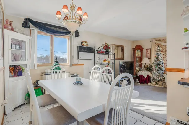 a kitchen with a sink cabinets and window